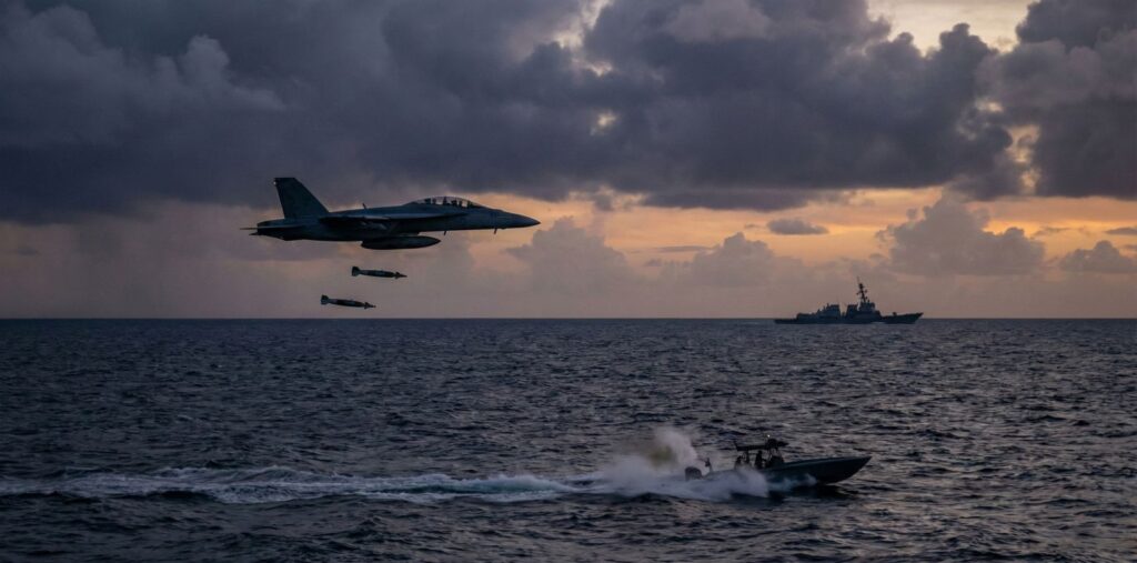 US Navy aircraft attacking a fast boat during the Venezuela Boat Strike in the Caribbean Sea